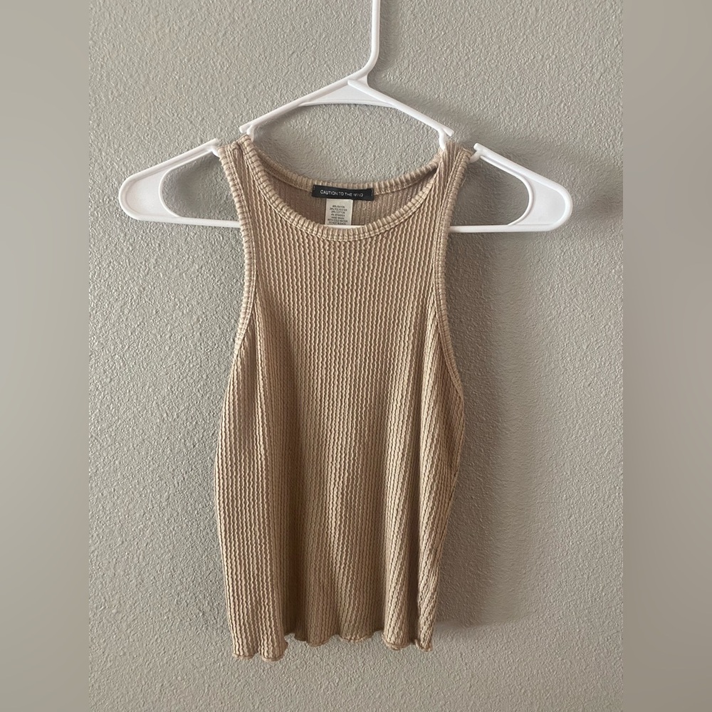 Caution to the wind beige rubbed tank